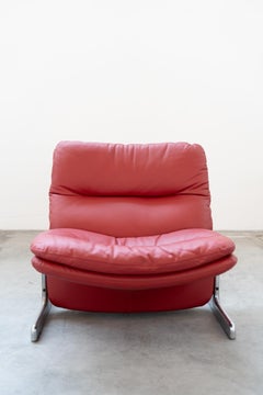 Sillón y reposapiés de cuero rojo, Vitelli y Ammannati, para Brunati 70/80
