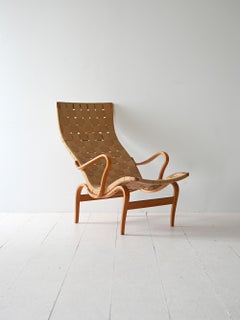 'Pernilla' armchair and footstool designed by Bruno Mathsson