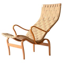 'Pernilla' armchair and footstool designed by Bruno Mathsson