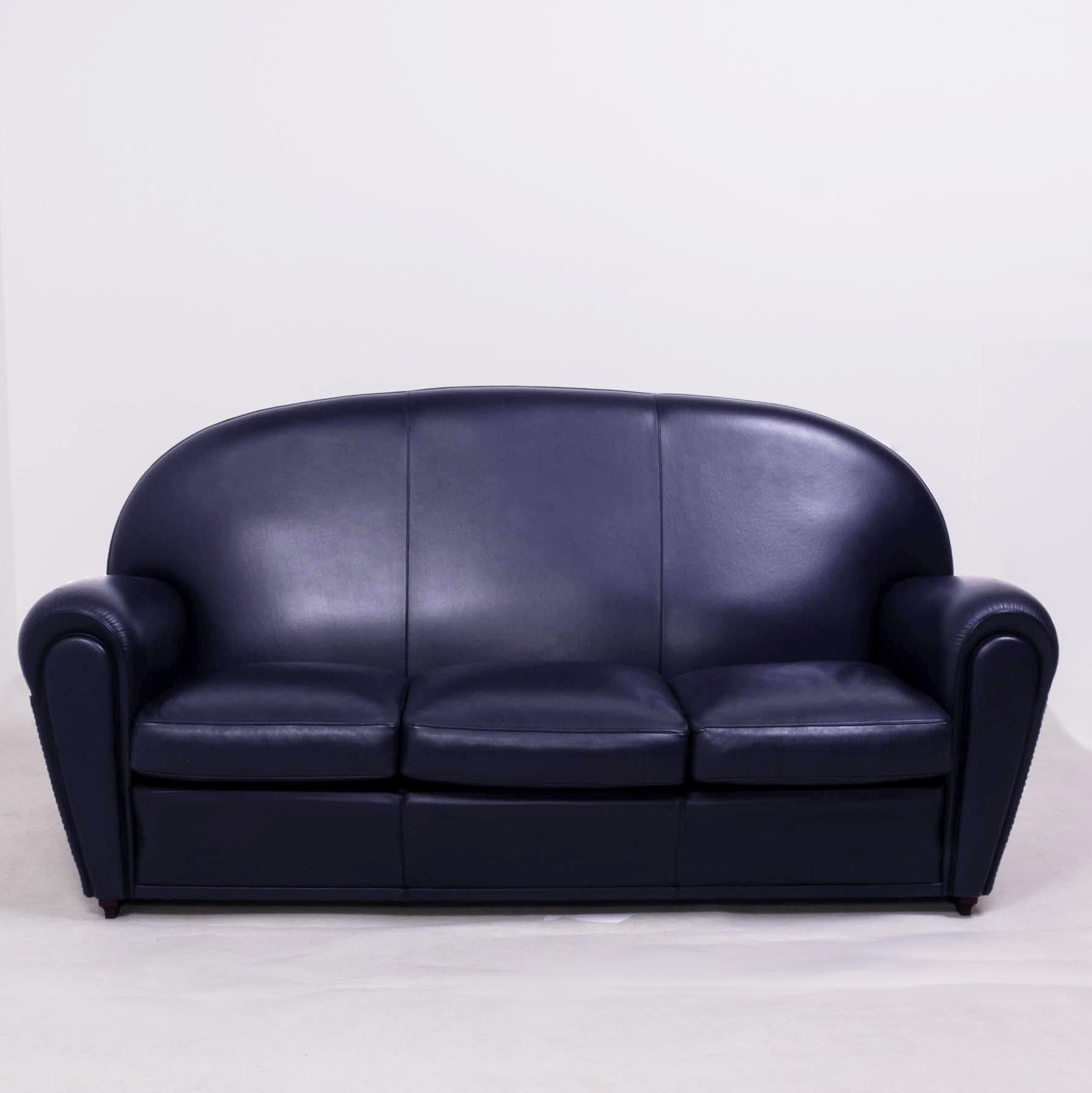 First produced in the 1930s, the vanity fair model by Poltrona Frau combines Art Deco style with modern day comfort.

Manufactured in Italy, the vanity fair is constructed from solid beech and is fully upholstered in a soft dark blue leather and