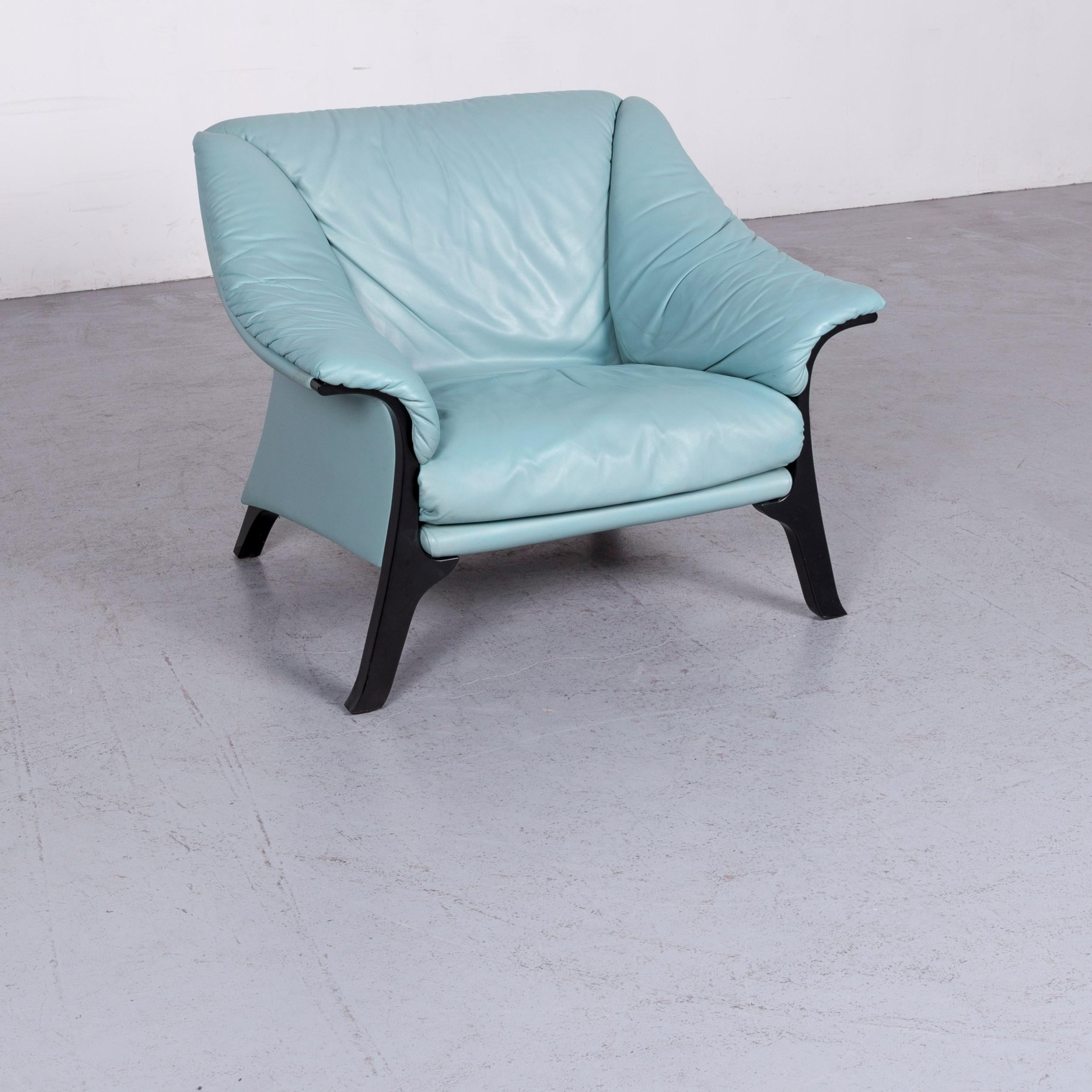 We bring to you a Poltrona Frau designer leather armchair blue one-seat chair.