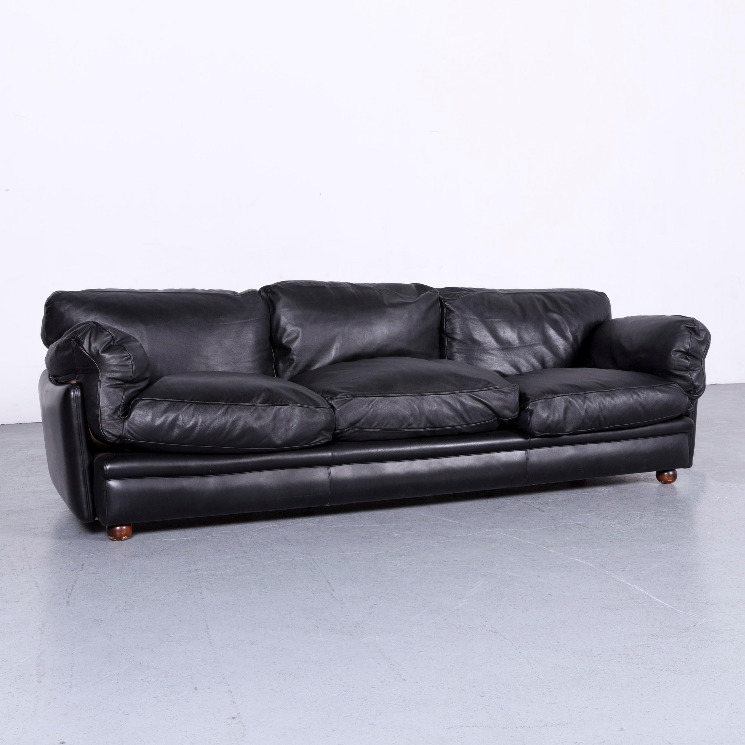 We bring to you a Poltrona Frau designer leather sofa in black three-seat couch.