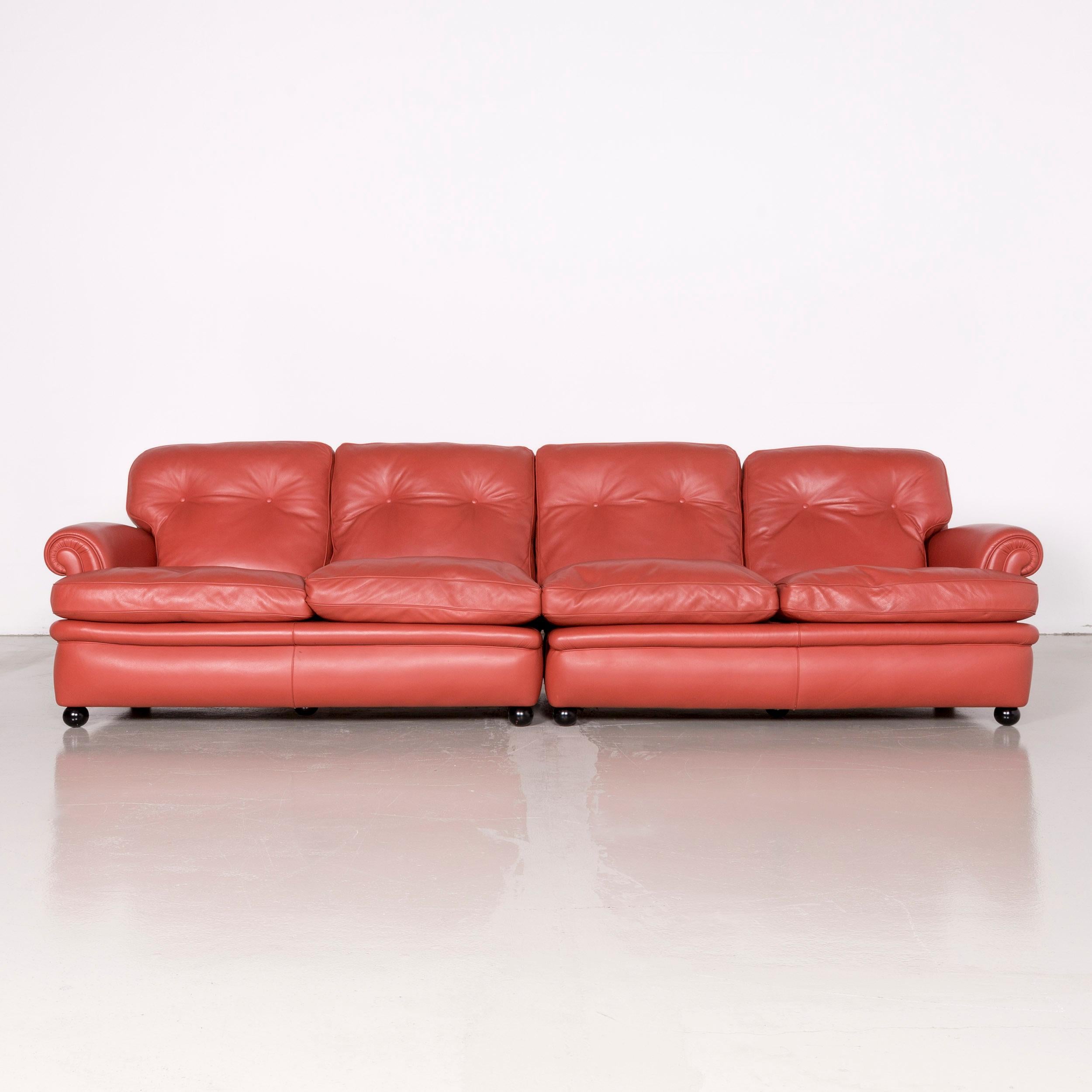 We bring to you a Poltrona Frau dream on sofa footstool set designer leather three-seat couch orange.