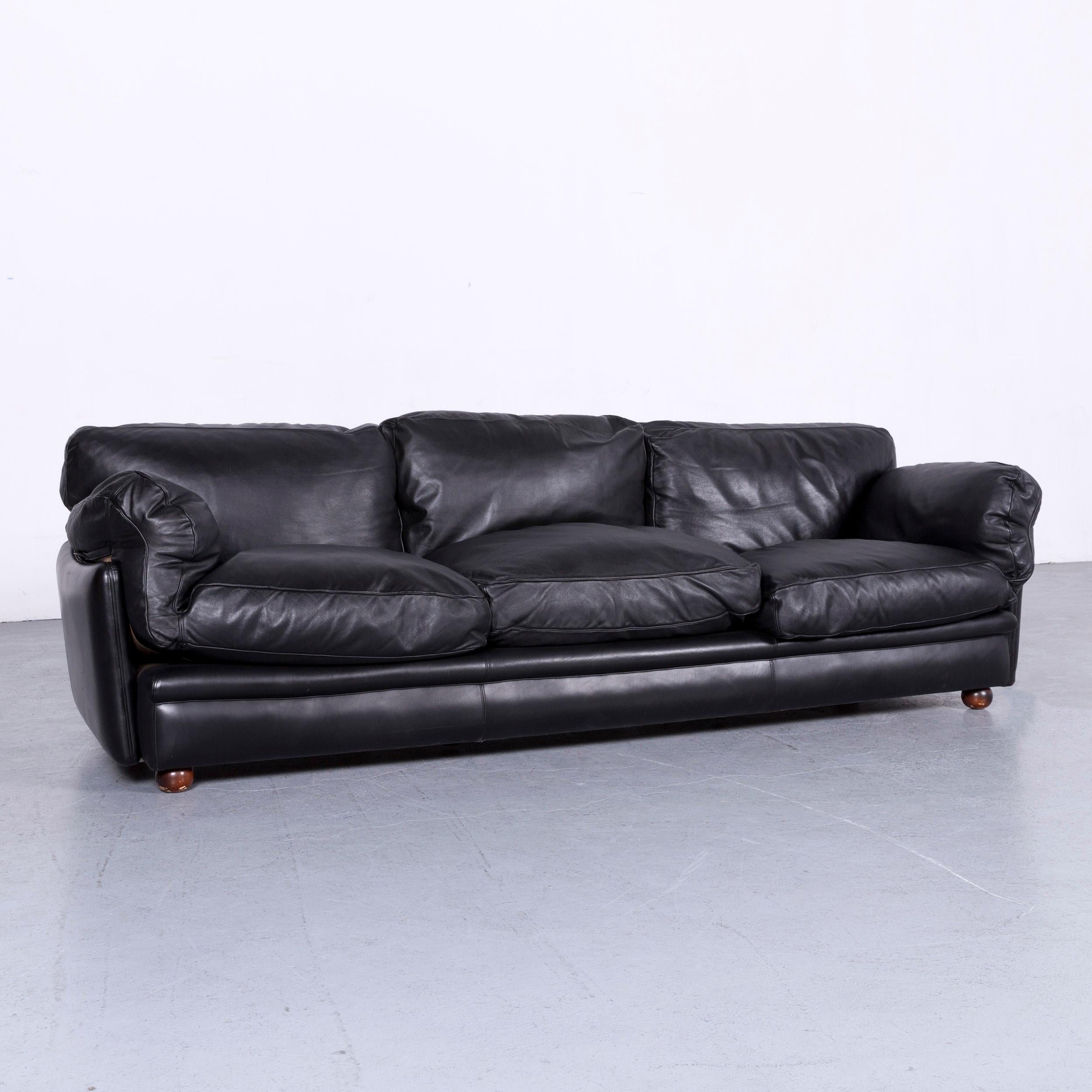 We bring to you a Poltrona Frau leather sofa black genuine leather three-seat couch.
 
Product measurements in centimetres:
 
Depth 90
Width 215
Height 70
Seat-height 40
Rest-height 60
Seat-depth 55.

       
   