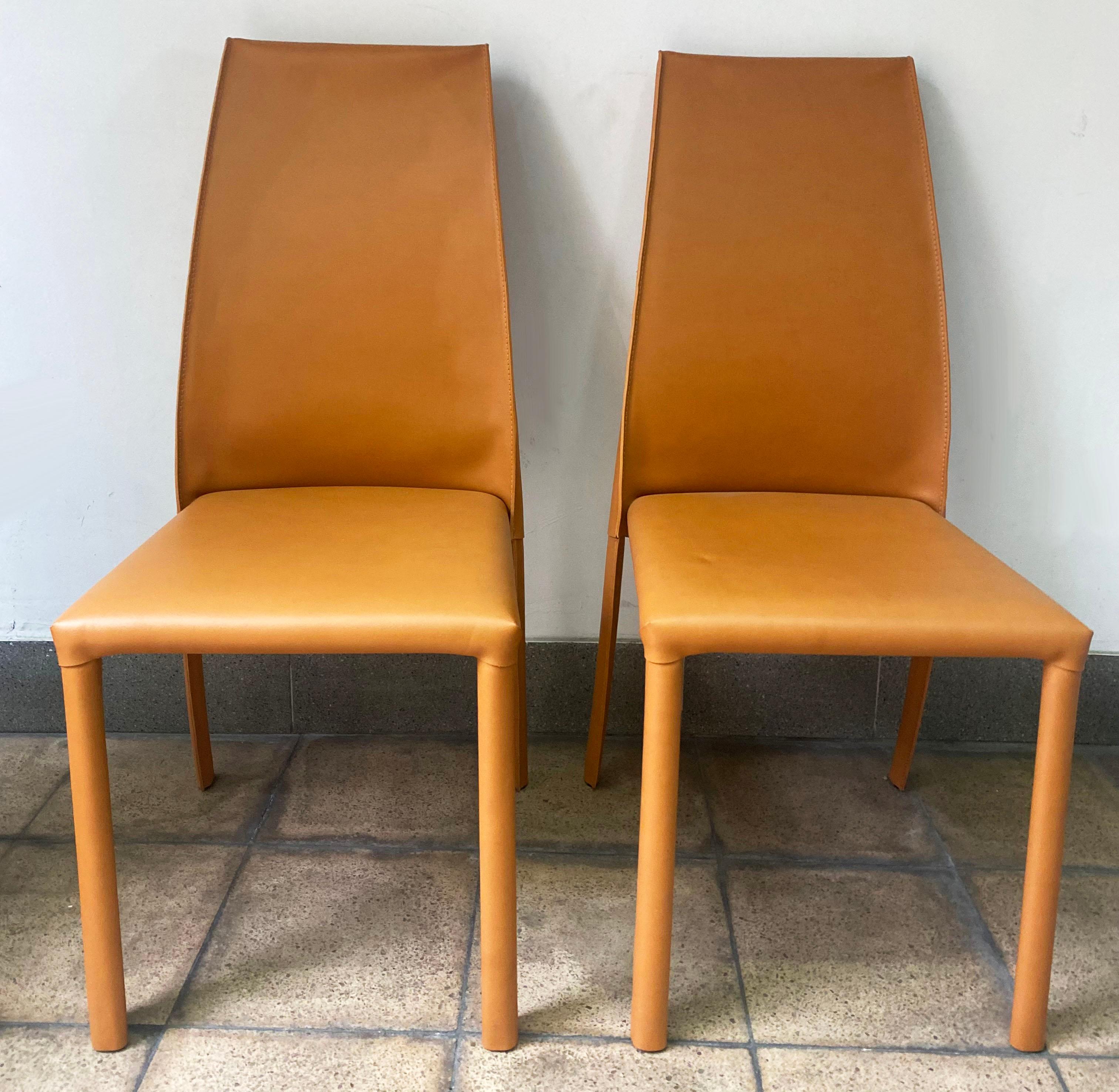 Poltrona Frau - Pair of Frag chairs 
Fawn leather 
Handmade in Italy 
Signed 
Dimensions: h103 x w42 cm x d42 cm

Price per pair 800€.