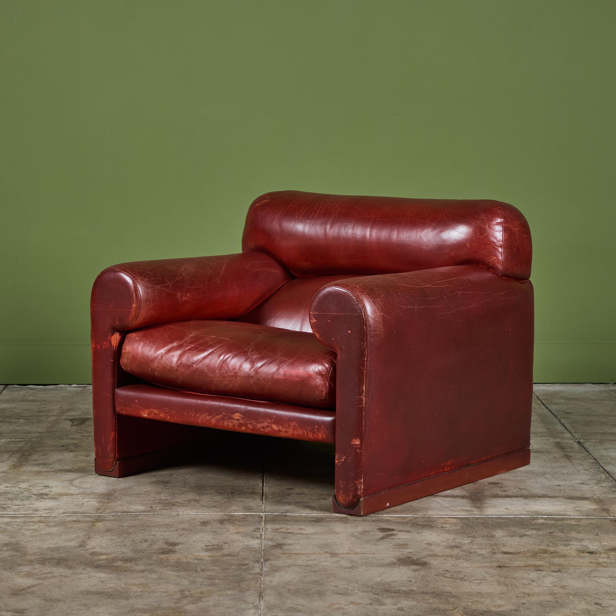 Postmodern leather club chair by Poltrona Frau, c.1980's, Italy. The chair features the original oxblood colored leather and a deep seat with curved armrests.

Dimensions
36