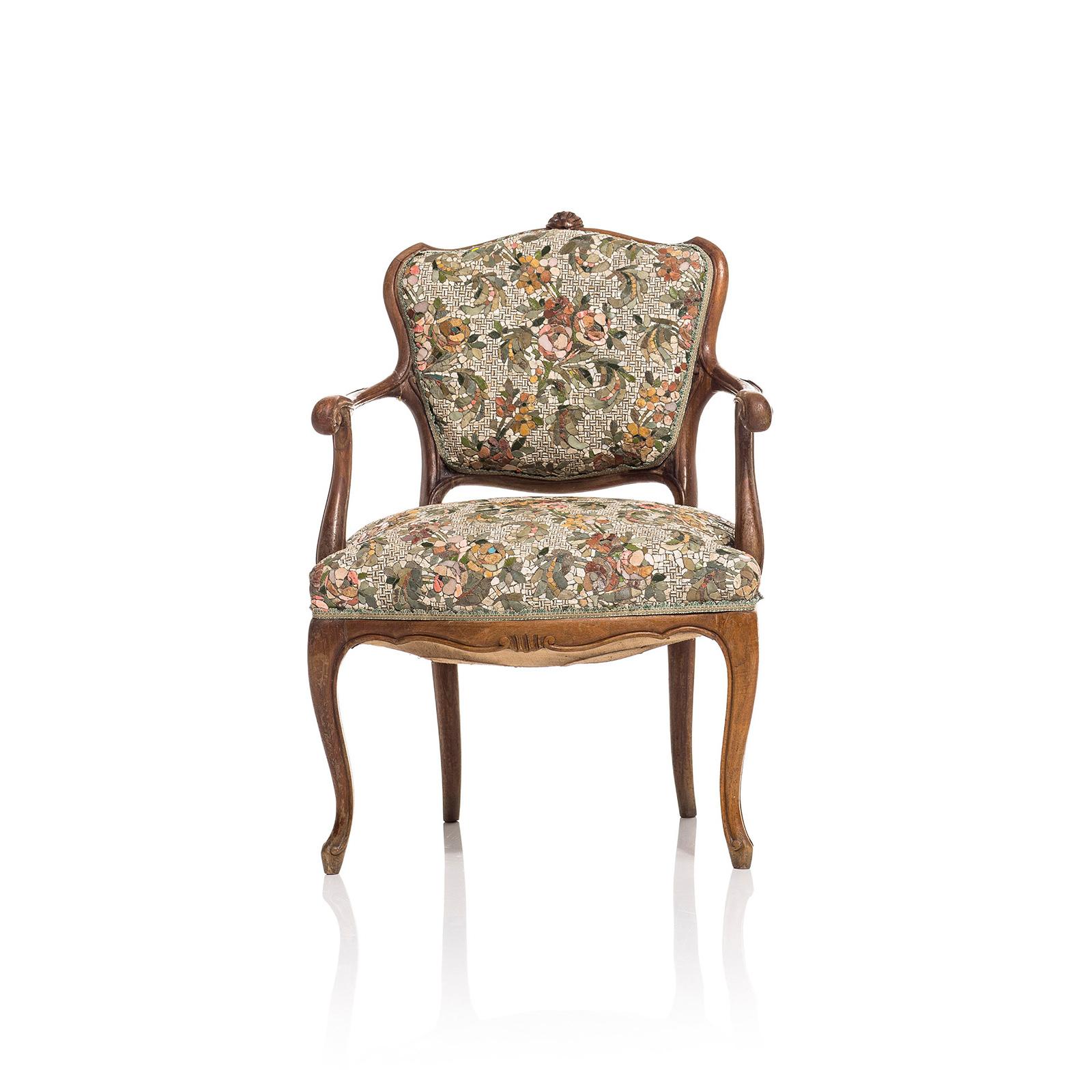 This Armchair has an antique frame and a seat made with unique handmade mosaic technique. The designer’s concept consists in the interpretation of various materials using exclusively marble and rocks, trying to surprise at the touch and look of the