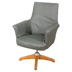 Poltrona girevole vintage anni 50 in pelle design Anonima Castelli