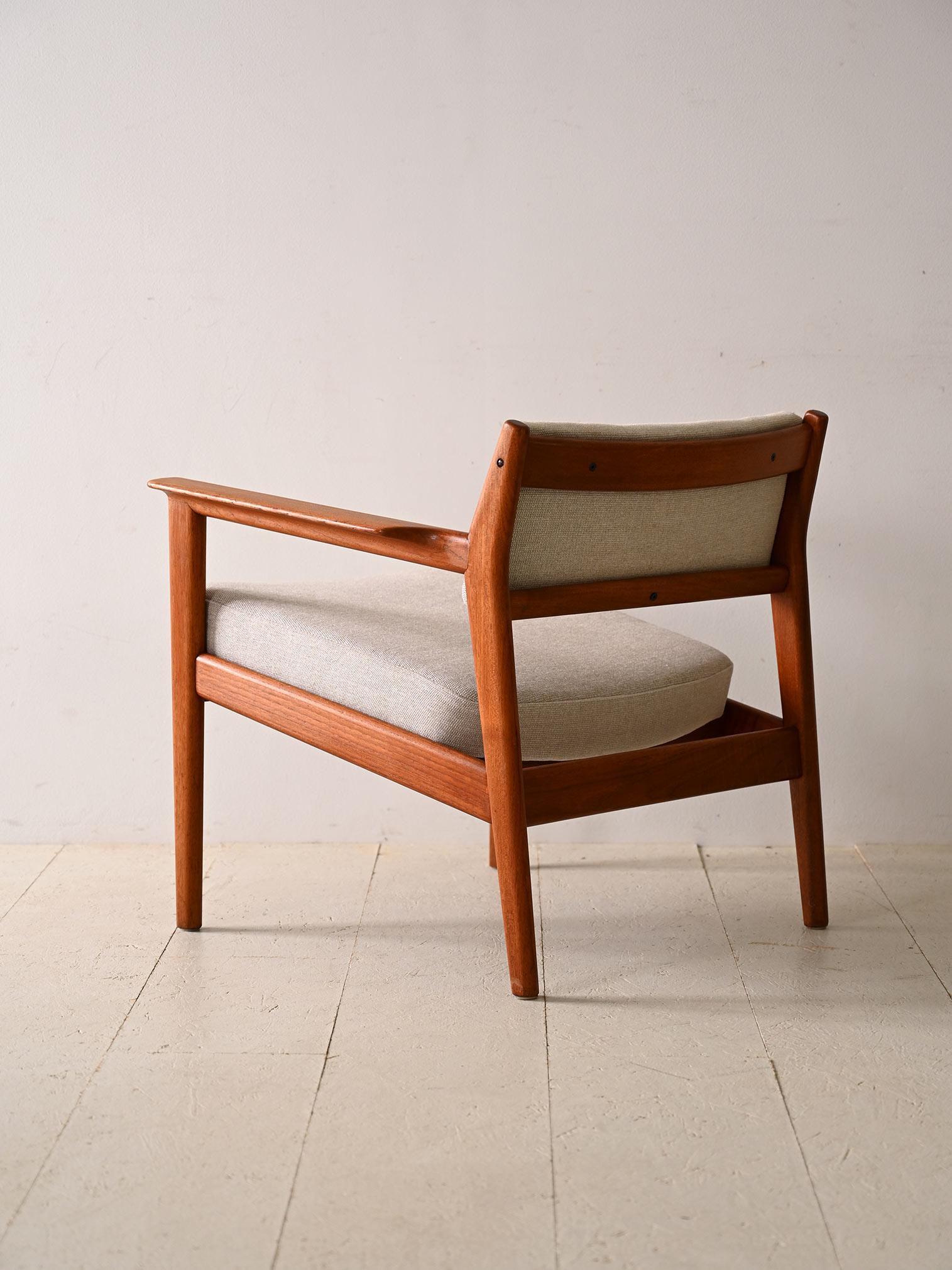 Scandinavian Upholstered armchair with teak frame For Sale