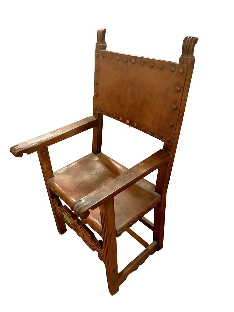 Antique leather armchair with studs, Italian.

Seventeenth-century walnut armchair with carved details and leather seat and back with brass studs.
Never restored but in very good condition.
Provenance Italy
Epoch: 17th century
Measurements: back