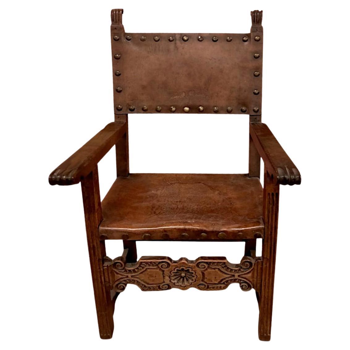Antique leather armchair with studs 17th century For Sale