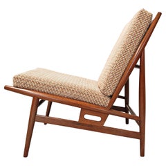 Poltrona in legno e tessuto originale vintage prodotta da ISA Bergamo 60s