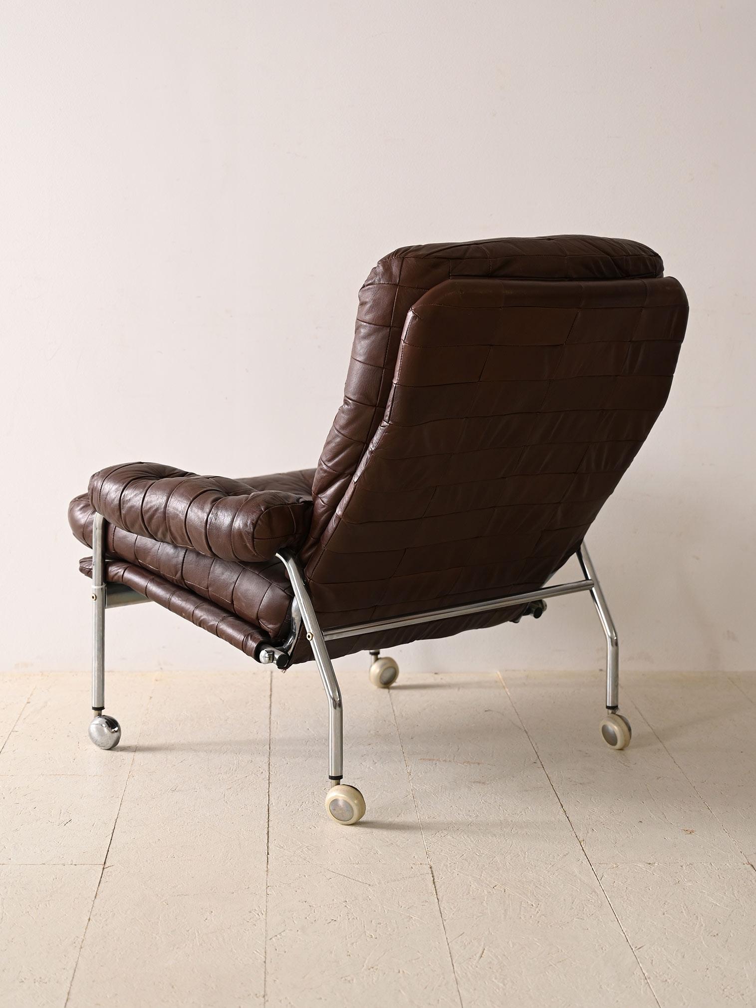 Scandinavian Modern Leather armchair with metal legs For Sale