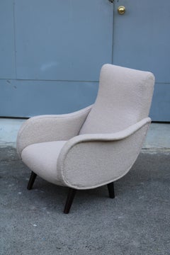 Sillón de estilo italiano Zanuso, con patas de madera y tapizado de tela, diseño de mediados de siglo