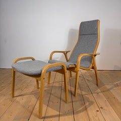 Lamino Armchair by Yngve Ekström, made of wood and gray fabric, Sweden, 1960s