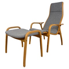 Lamino Armchair by Yngve Ekström, made of wood and gray fabric, Sweden, 1960s