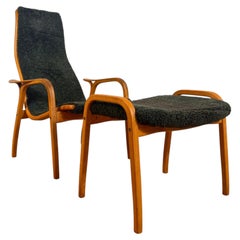 Lamino Armchair by Yngve Ekström, made of wood and green fabric, Sweden, 1960s