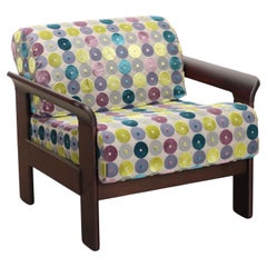 Restored armchair with wooden frame 1970s