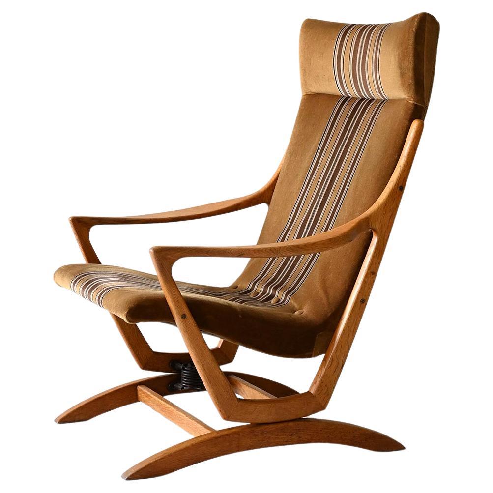 Poltrona scandinava originale anni ’60 in rovere con schienale alto