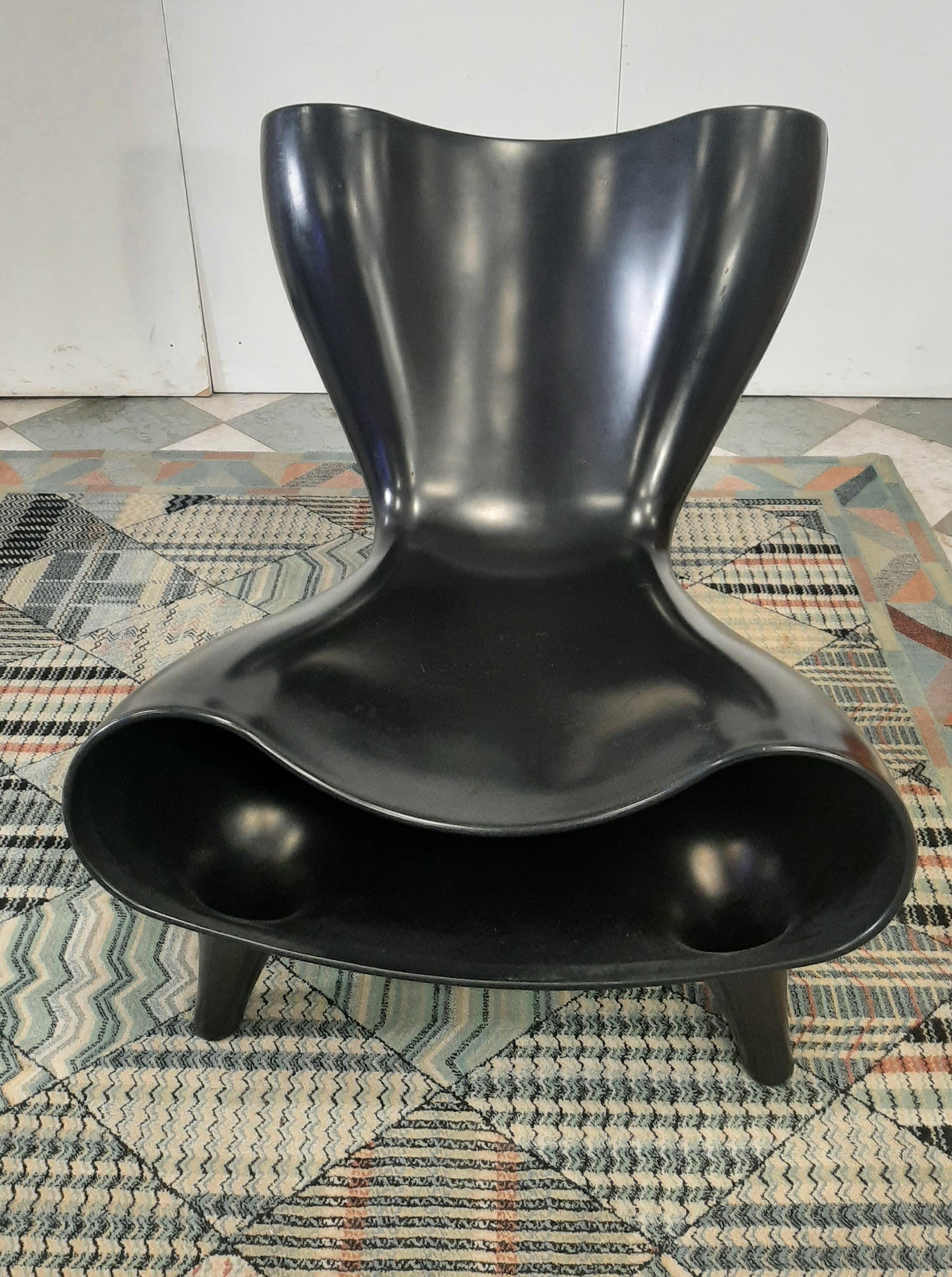 Plastic Poltrona sedia modello Orgone designer Marc Newson