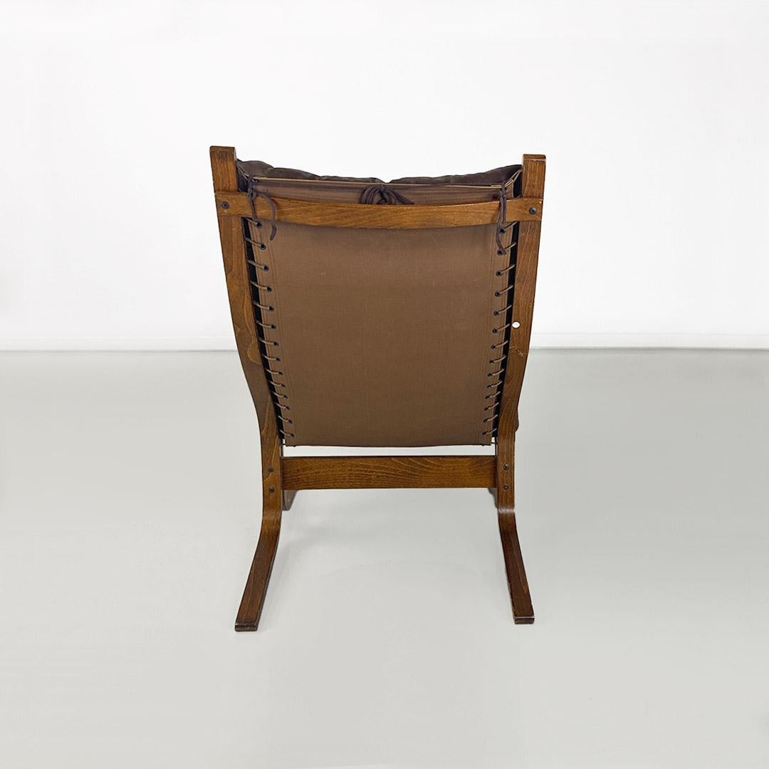 Leather Siesta armchair in wood and leather by Ingmar Relling for Westnofa Vestlandske 1970 For Sale