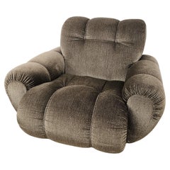 Poltrona vintage anni '70 con base in legno