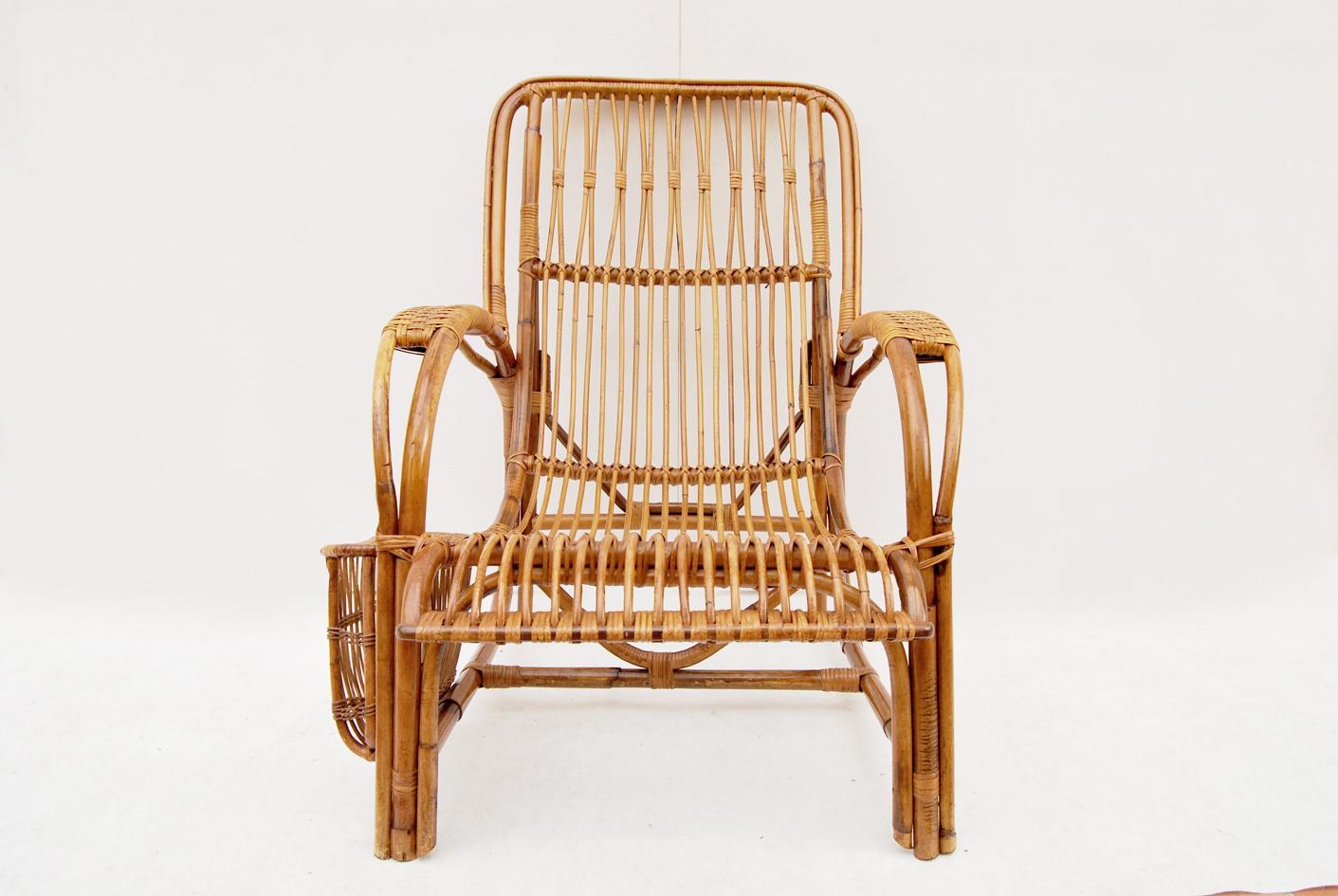 This rare vintage bamboo and wicker armchair dates from the second half of the 20th century. Its very beautiful shape, skillful weaving and side magazine pocket make it a unique piece that will enrich any outdoor or indoor setting.
The item is in