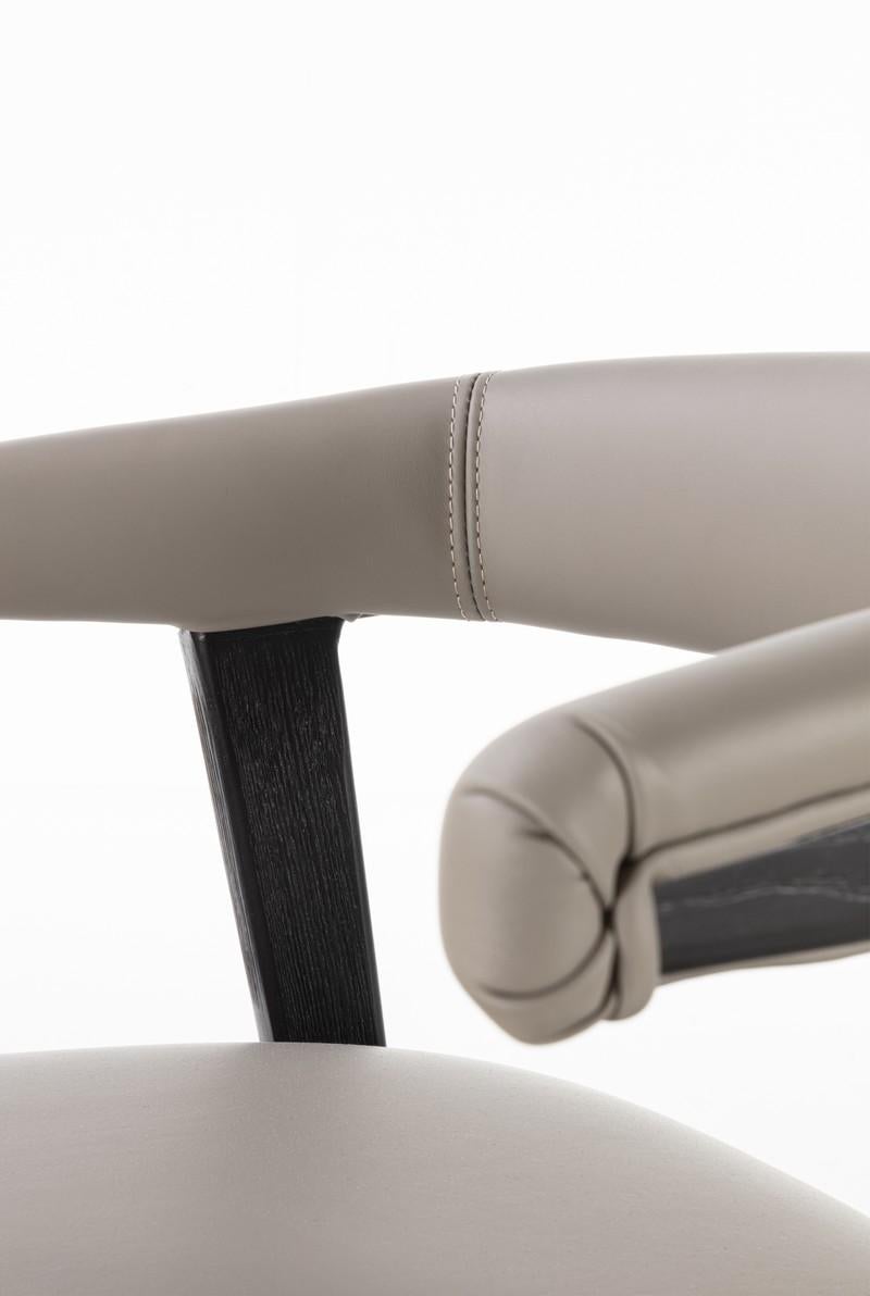 Modern Aida modern solid wood armchair upholstered in leather For Sale