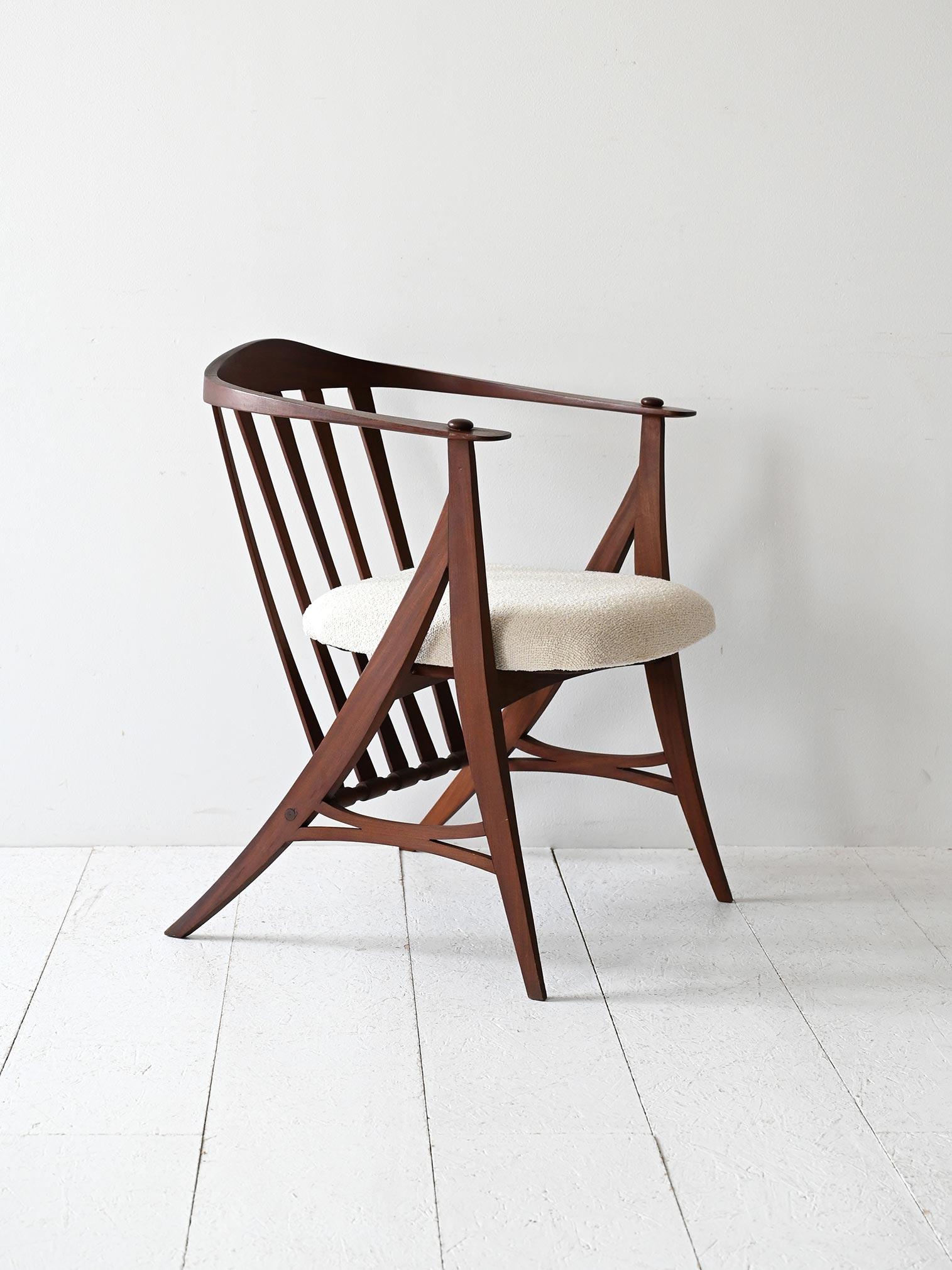 Scandinavian Modern 1950s vintage sculptural armchair with carved frame and new upholstery For Sale