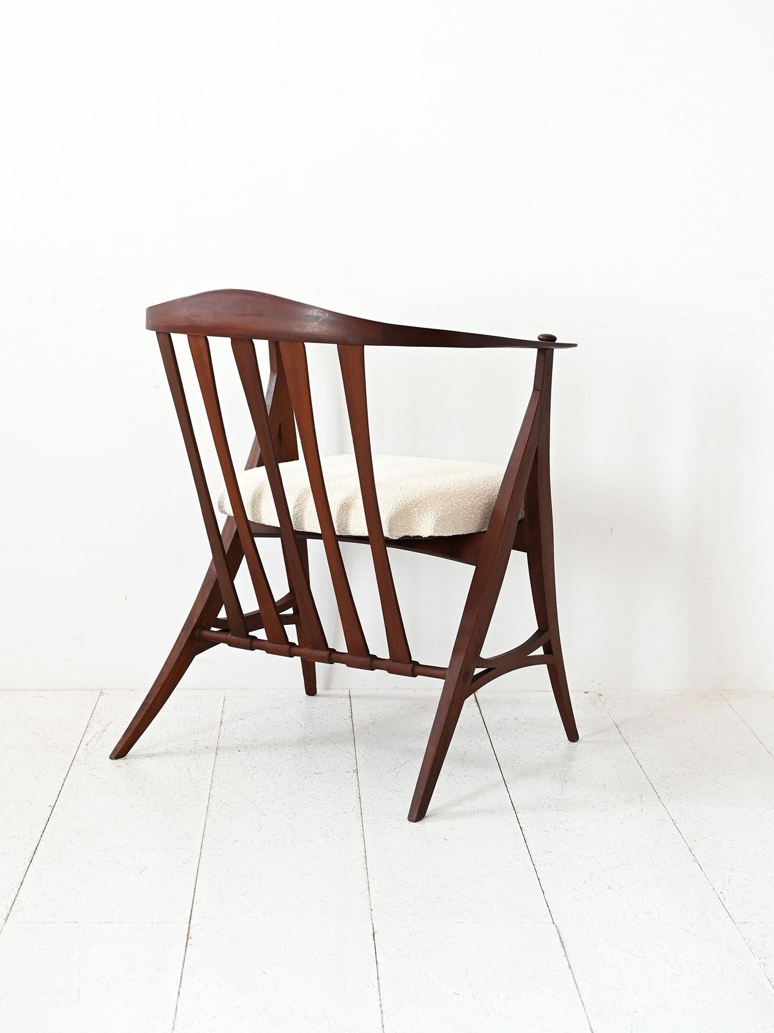 Scandinavian 1950s vintage sculptural armchair with carved frame and new upholstery For Sale