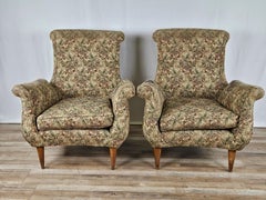 1970s floral fabric armchairs with wooden feet
