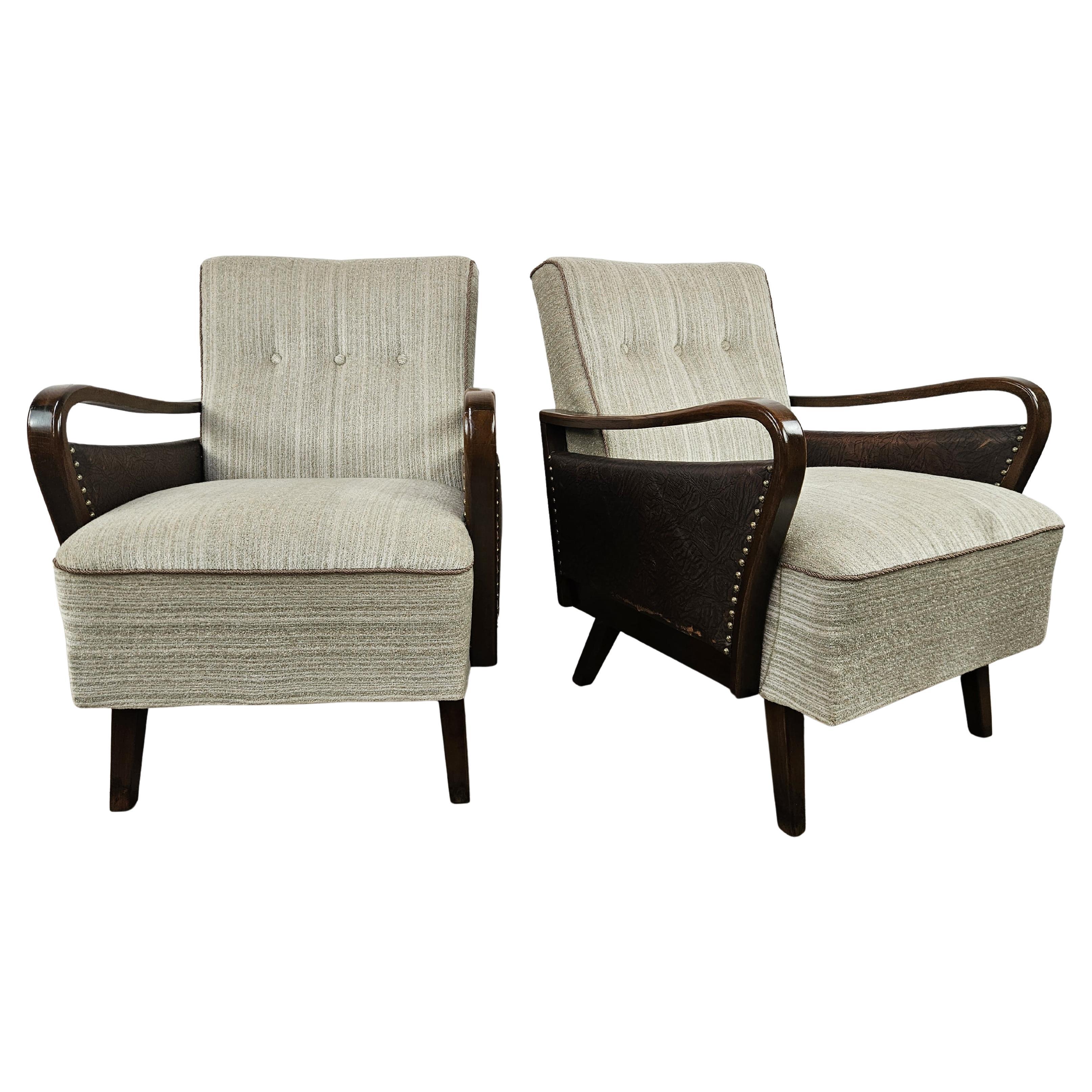 Art Deco 1940s walnut armchairs with leather and fabric upholstery