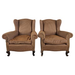 Poltrone bergere anni '50 in stoffa con piedi in legno