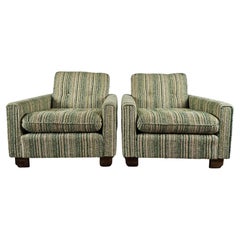 Green and white cloth armchairs with wooden feet