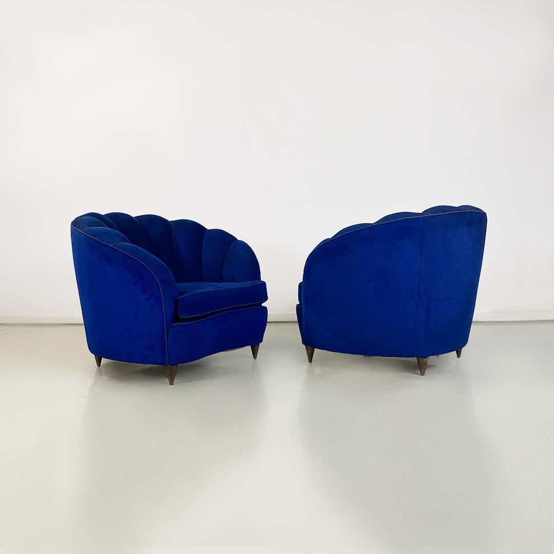 Mid-Century Modern Italian shell armchairs, in electric blue fabric and wooden legs, 1950s For Sale