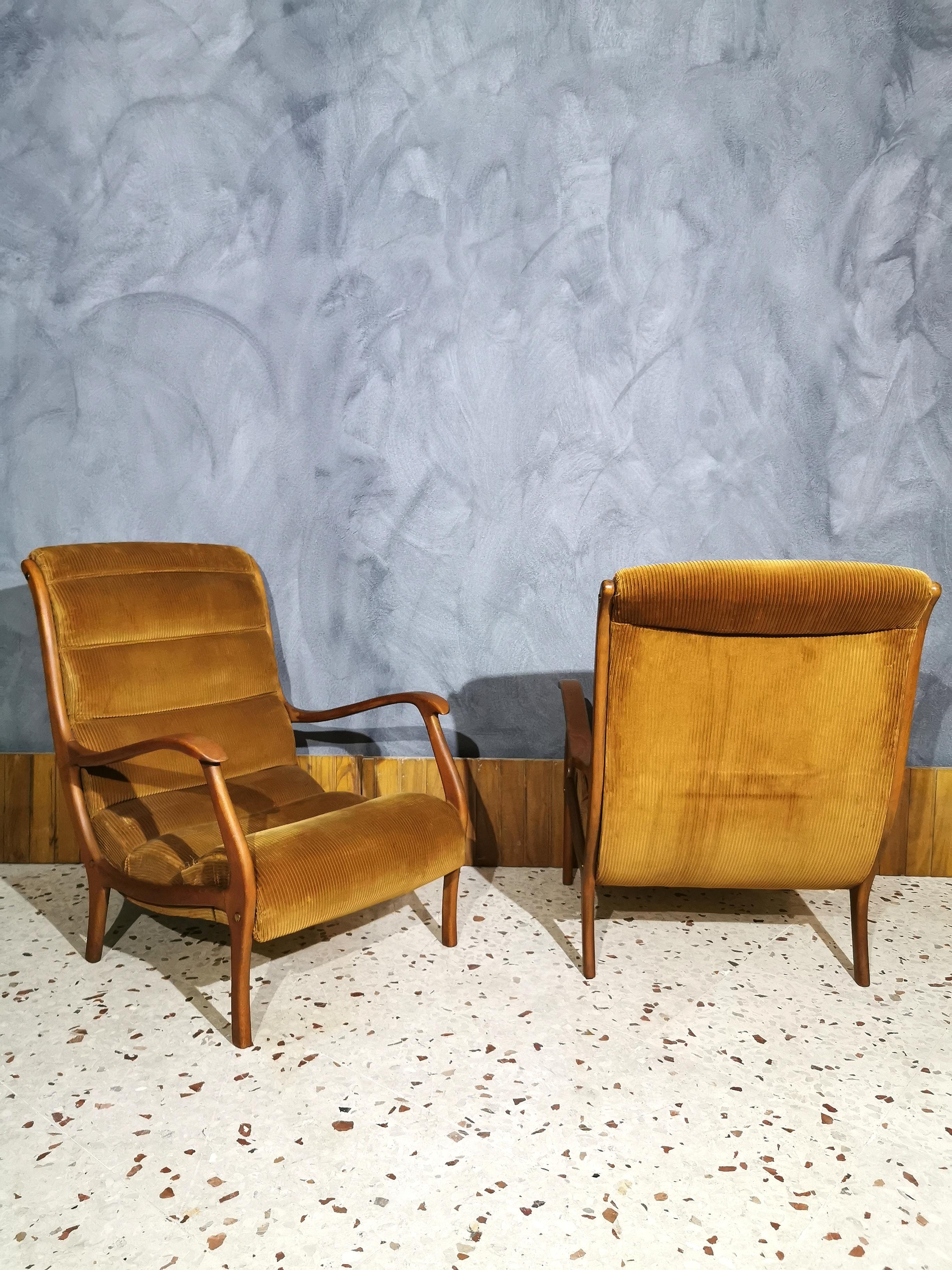Beautiful and rare set of vintage Italian armchairs designed by Ezio Longhi for Elam with an organic and elegant design, with wooden structure, still original cognac-colored velvet seats.