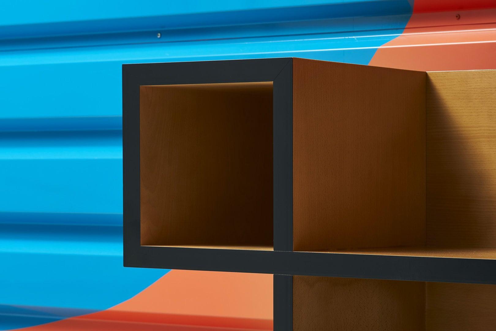Designed in 1967 by the Florentine Radical group Archizoom, this was the first sofa without a conventional frame. It is composed of two waves made from a polyurethane block cut into two parts with an S—shaped incision, which can be interlocked and