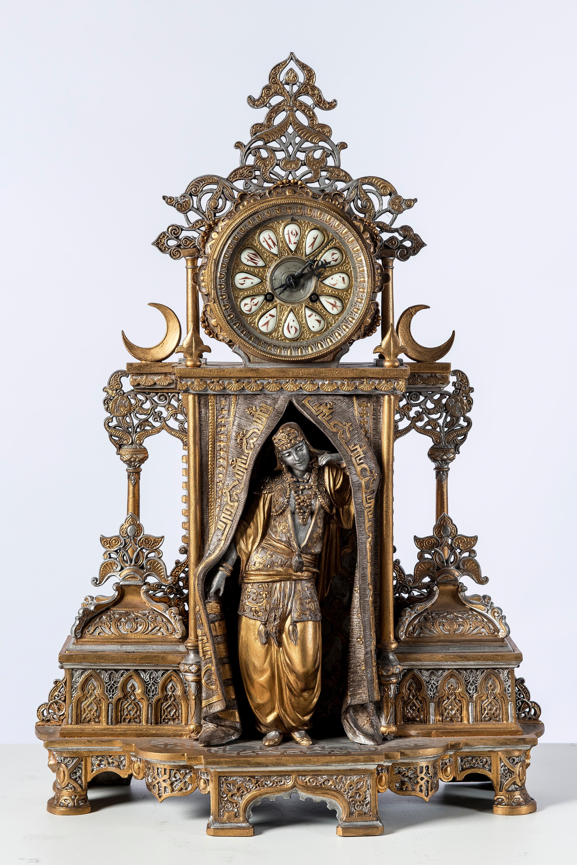 Polychrome alloy bronze garniture. Orientalist style, 1860.
Machine clock signed 1570.