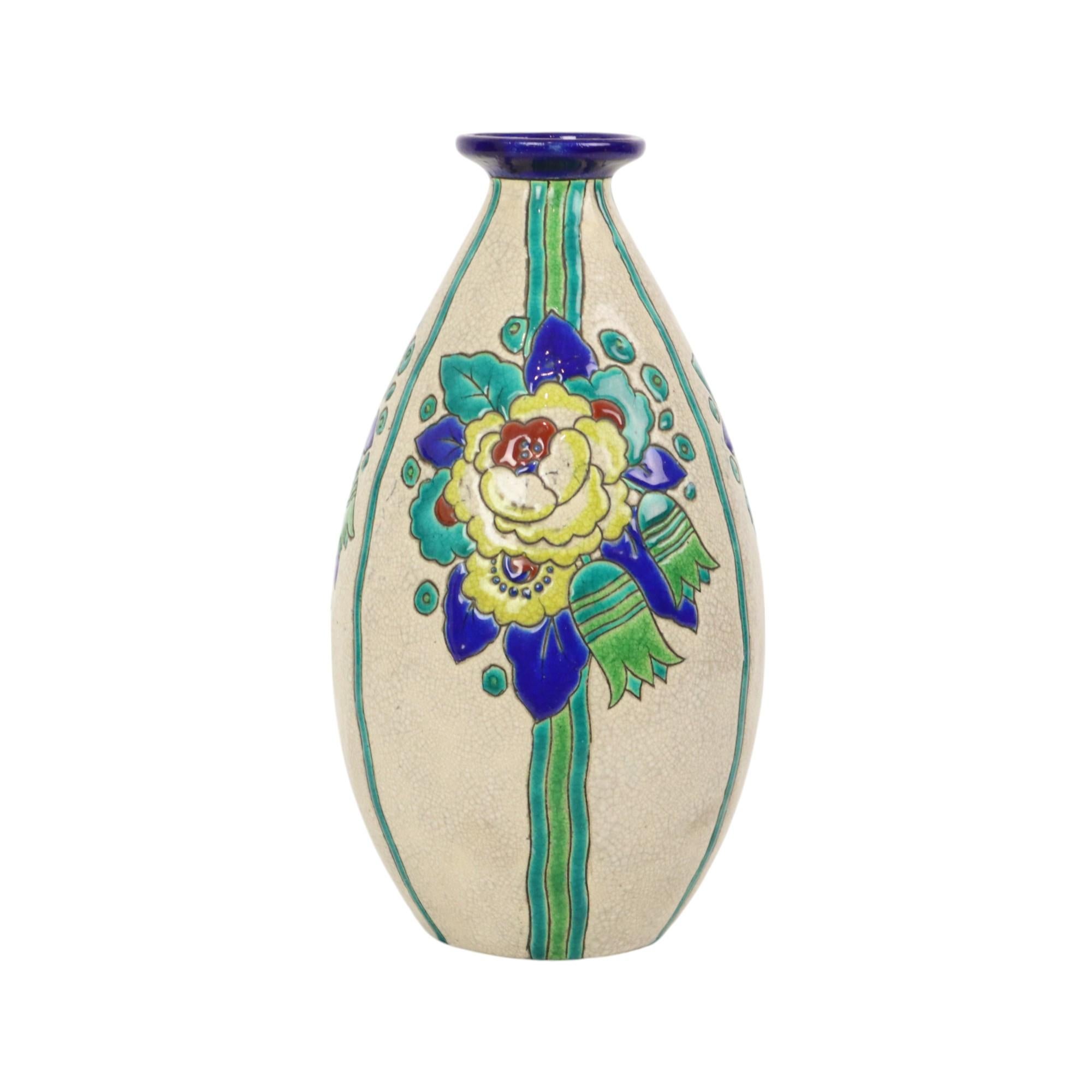 Beautiful and rare enamelled art deco vase, designed by the studio of Charles Catteau for Boch Frères, Belgium, circa 1920s, decor number D2366, marked and numbered at the bottom.

This polychrome vase has three panels over the height of the belly,