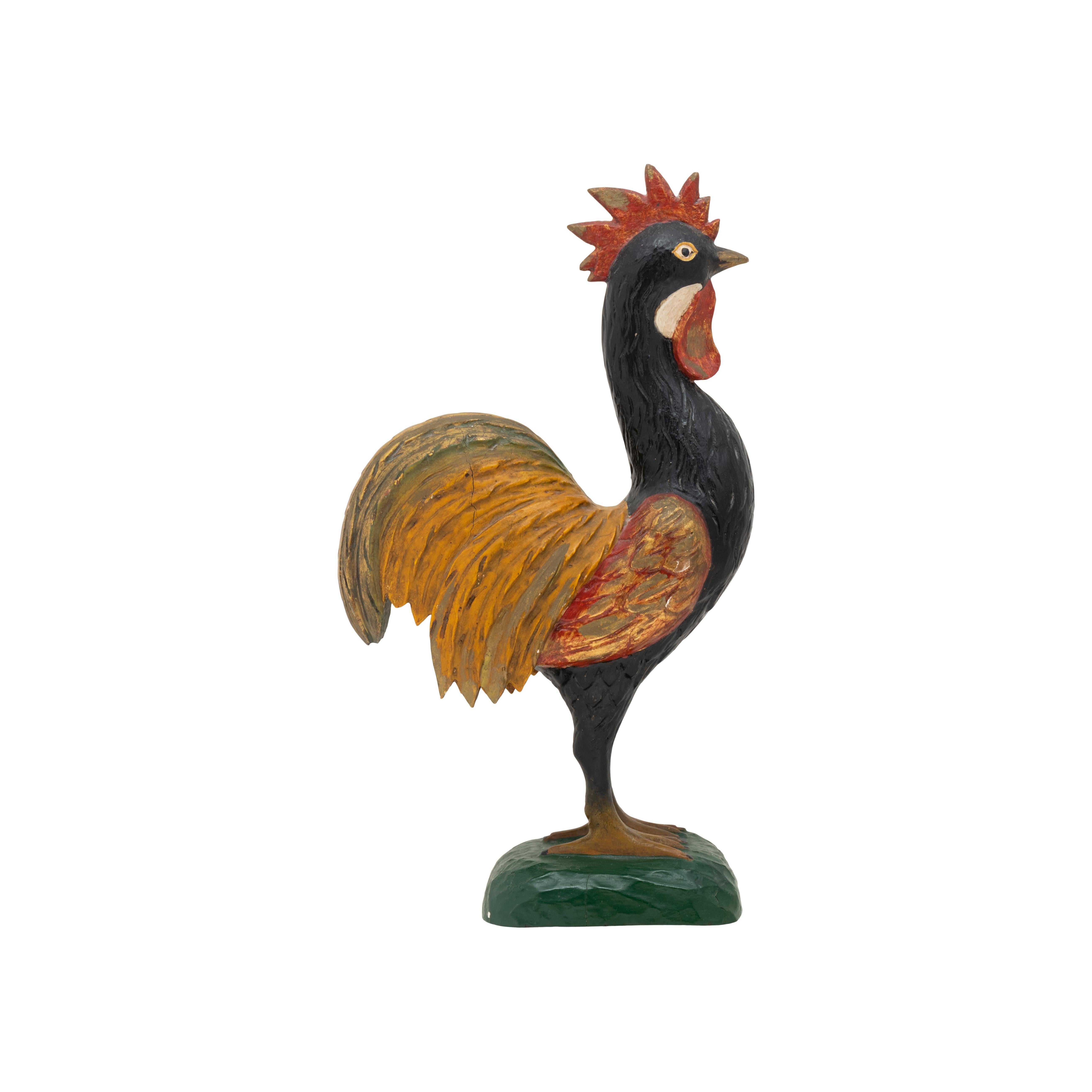 Mid 20th Century American polychrome carved figure of a rooster. Beautiful colors of black, orange, red, brown, cream and green. 

PERIOD: Mid 20th Century
ORIGIN: Unknown, United States
SIZE: 16