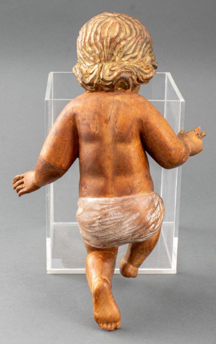Scultura di Gesù Bambino in legno scolpito in policromia in vendita 1