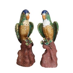 Polychrome Ceramic Majolica Parrot Figurines in Green and Blue, a Pair