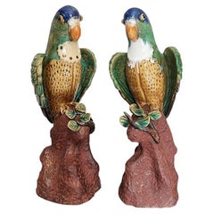 Vintage Polychrome Ceramic Majolica Parrot Figurines in Green and Blue, a Pair
