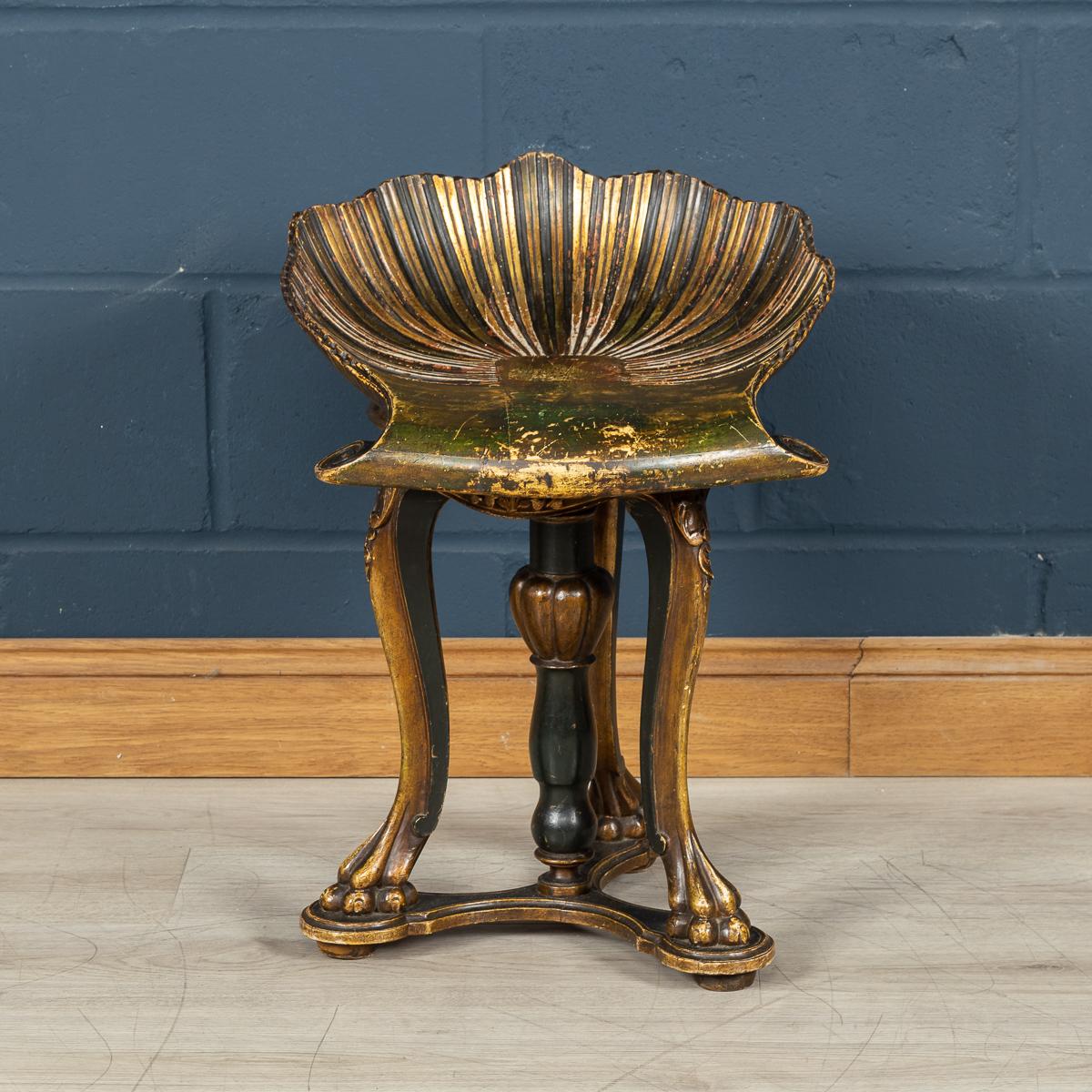 A beautiful carved antique fruitwood grotto stool, polychrome-decorated, the bench standing on cabriole legs joined with a bottom stretcher, and bun feet reminiscent of animal paws made in Venice around the turn of the 19th century. The seat has a