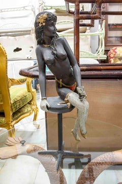 Polychrome Decorative Sculpture of a Seated Female Figure