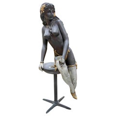 Polychrome Decorative Sculpture of a Seated Female Figure