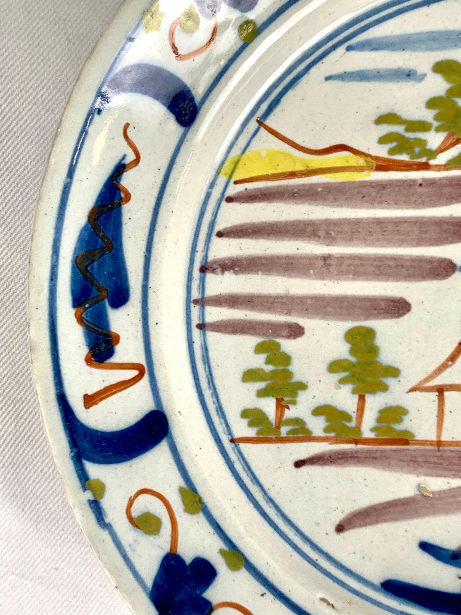 Hand-Painted Polychrome Dutch Delft Dish Hand Painted with Country Scene Circa 1780 For Sale