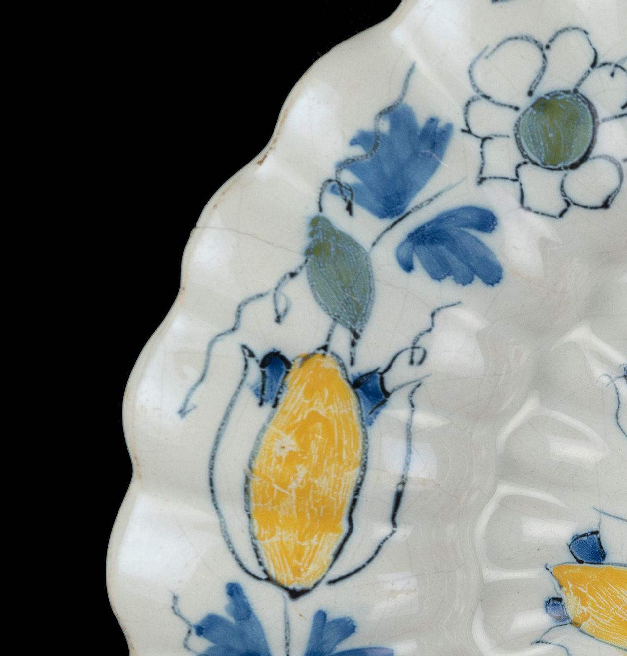 Baroque Polychrome Lobed Dish with Peacock and Tulips Delft, circa 1690 For Sale