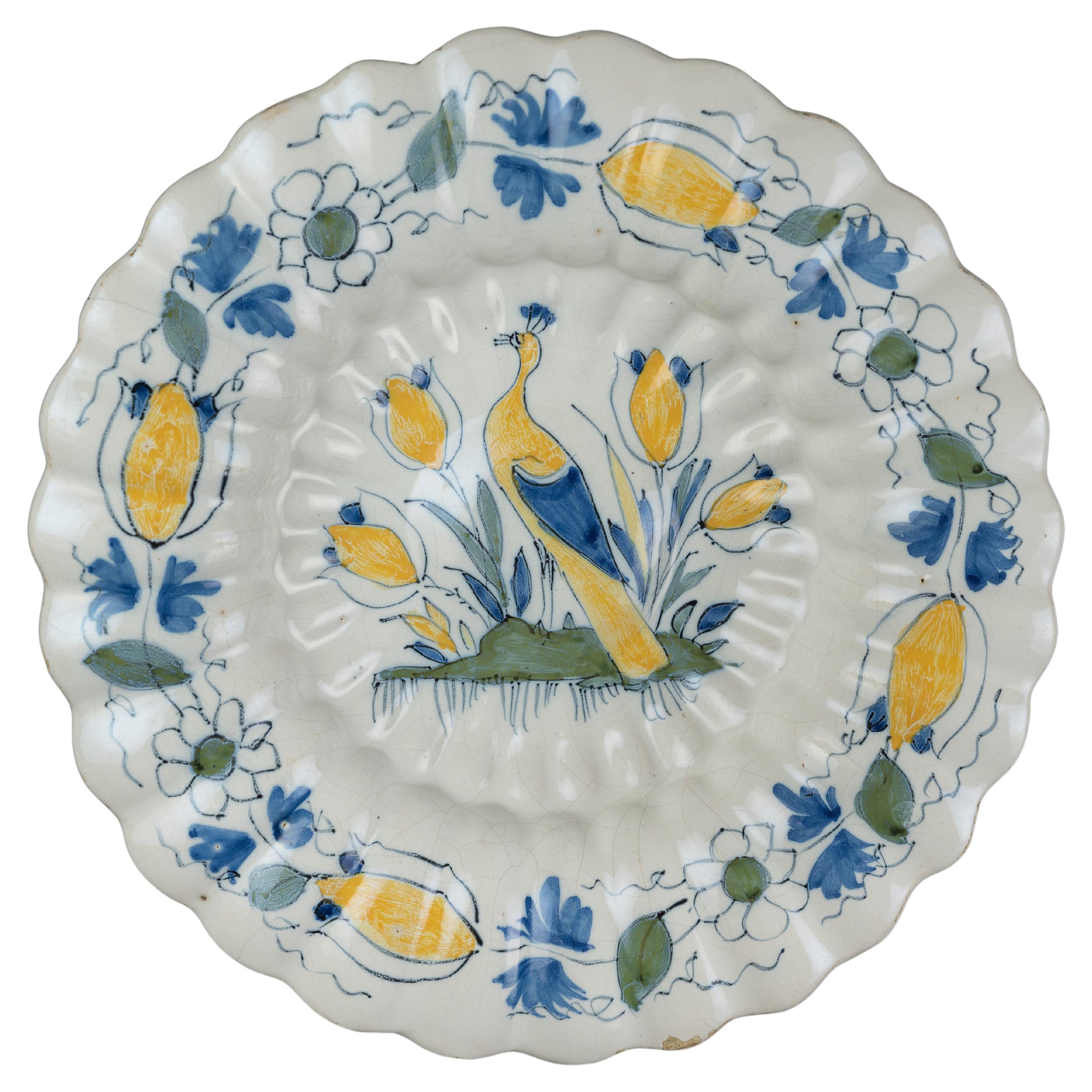 Polychrome Lobed Dish with Peacock and Tulips Delft, circa 1690 For Sale