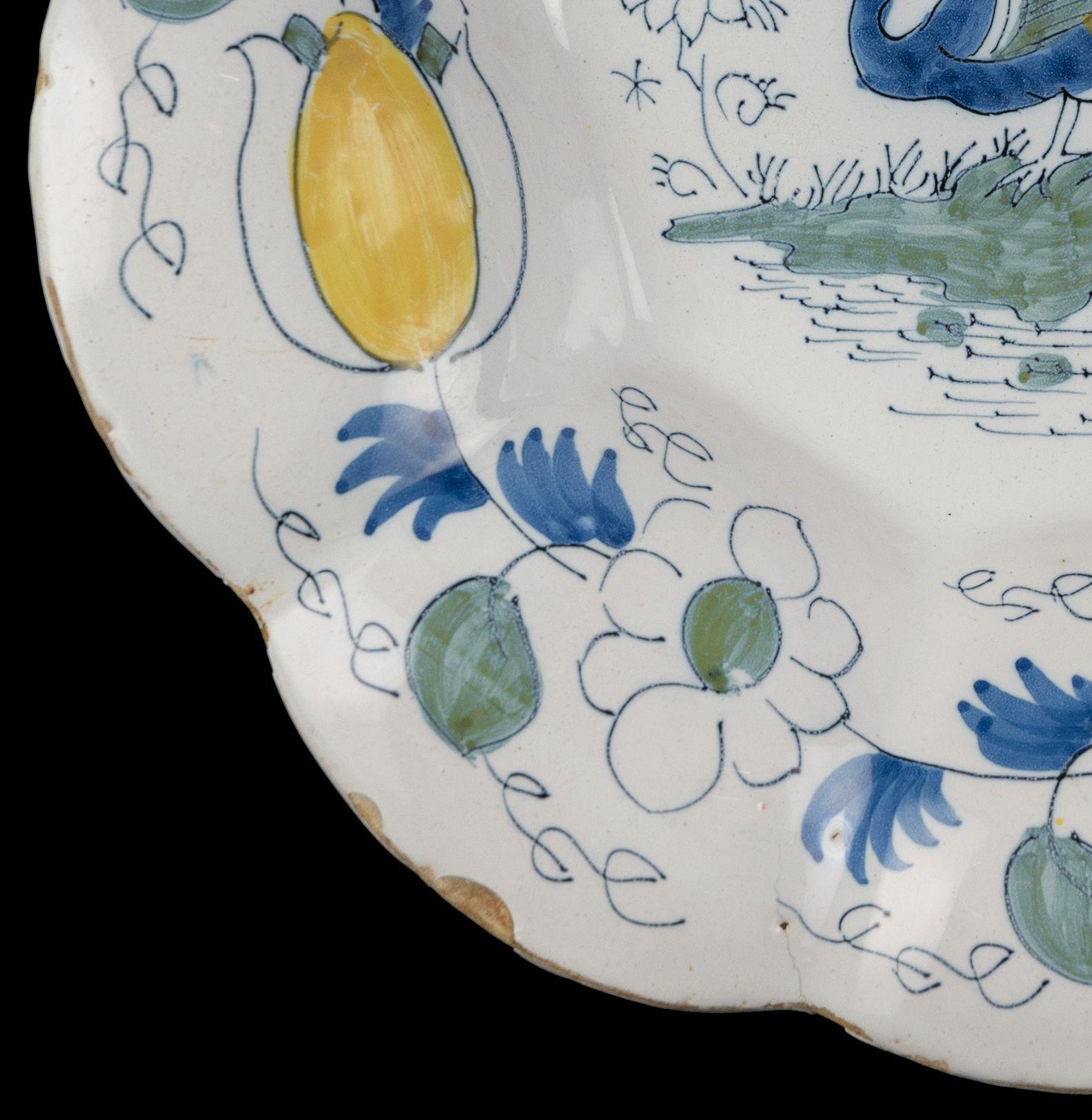 17th Century Polychrome Lobed Dish with Peacock in Landscape, Delft, circa 1690 For Sale